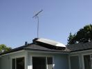 Roof with solar water heater