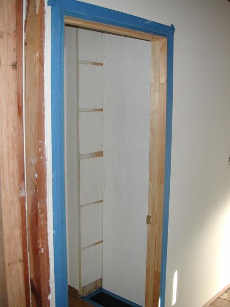 01/25 - The temporary wall in the laundry closet, for bathroom privacy