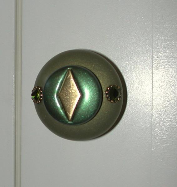 06/20 - Fancy Susan Goldstick knob on the laundry closet.  Shiny!