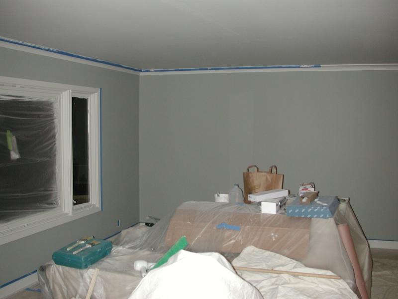 03/18 - The first coat of paint in the living room