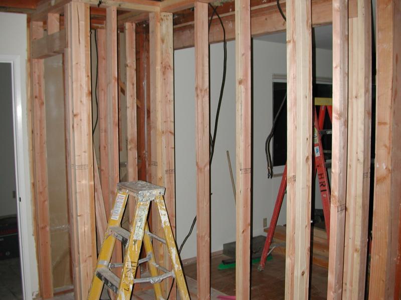 12/23 - Bar and broom closet framed in